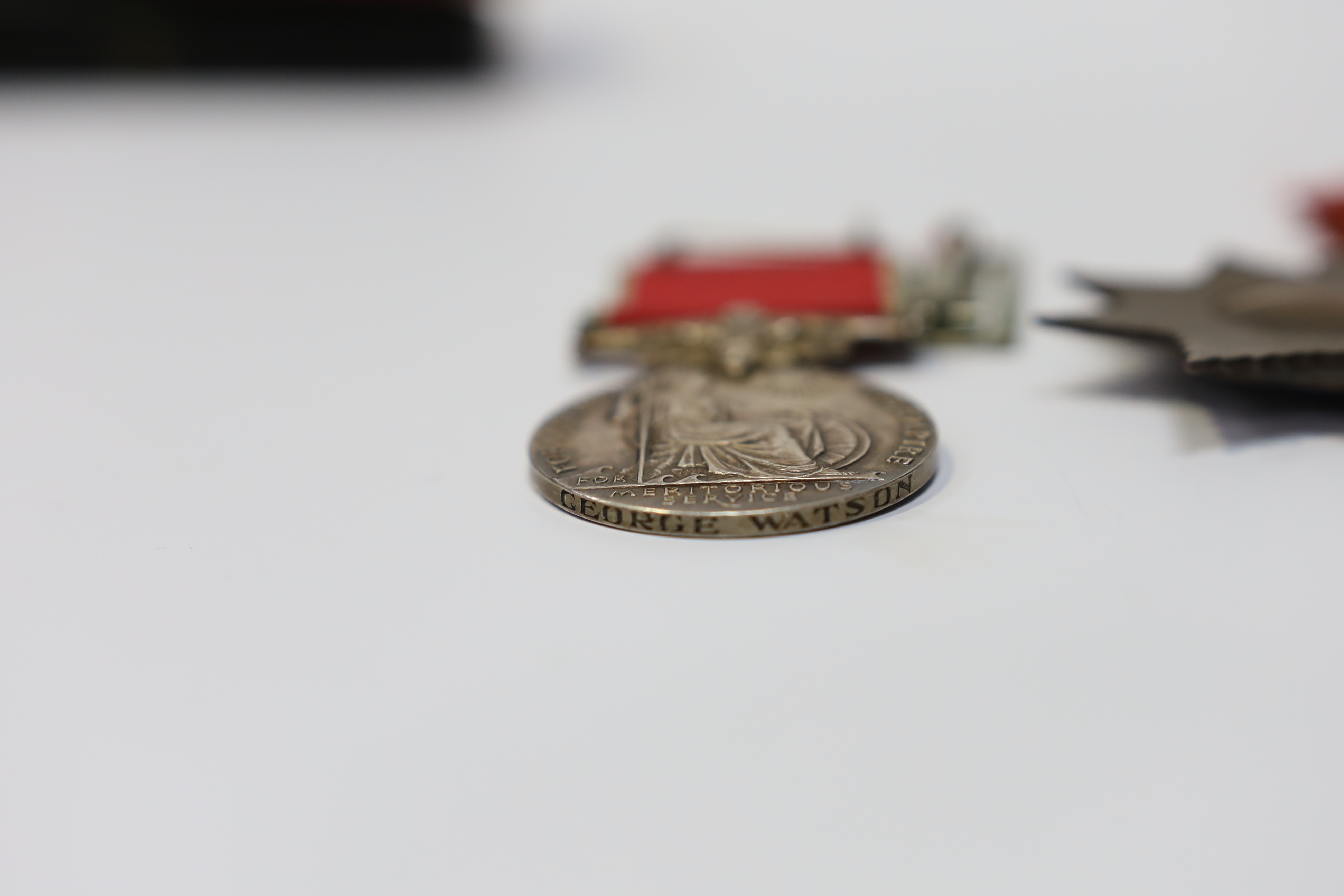 A cased George VI civil issue British Empire medal, awarded to George Watson, together with a cased George V Imperial Service Medal awarded to Richard Braid (2). Condition - fair to good